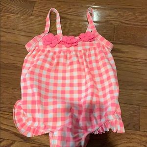 Pink and white checkered bathing suit